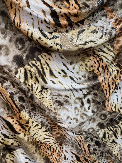 New Exotic multi animal print Taupe multicolor with clear foil print on poly spandex 2-way stretch 58-60” Sold by the YD. Ships Worldwide