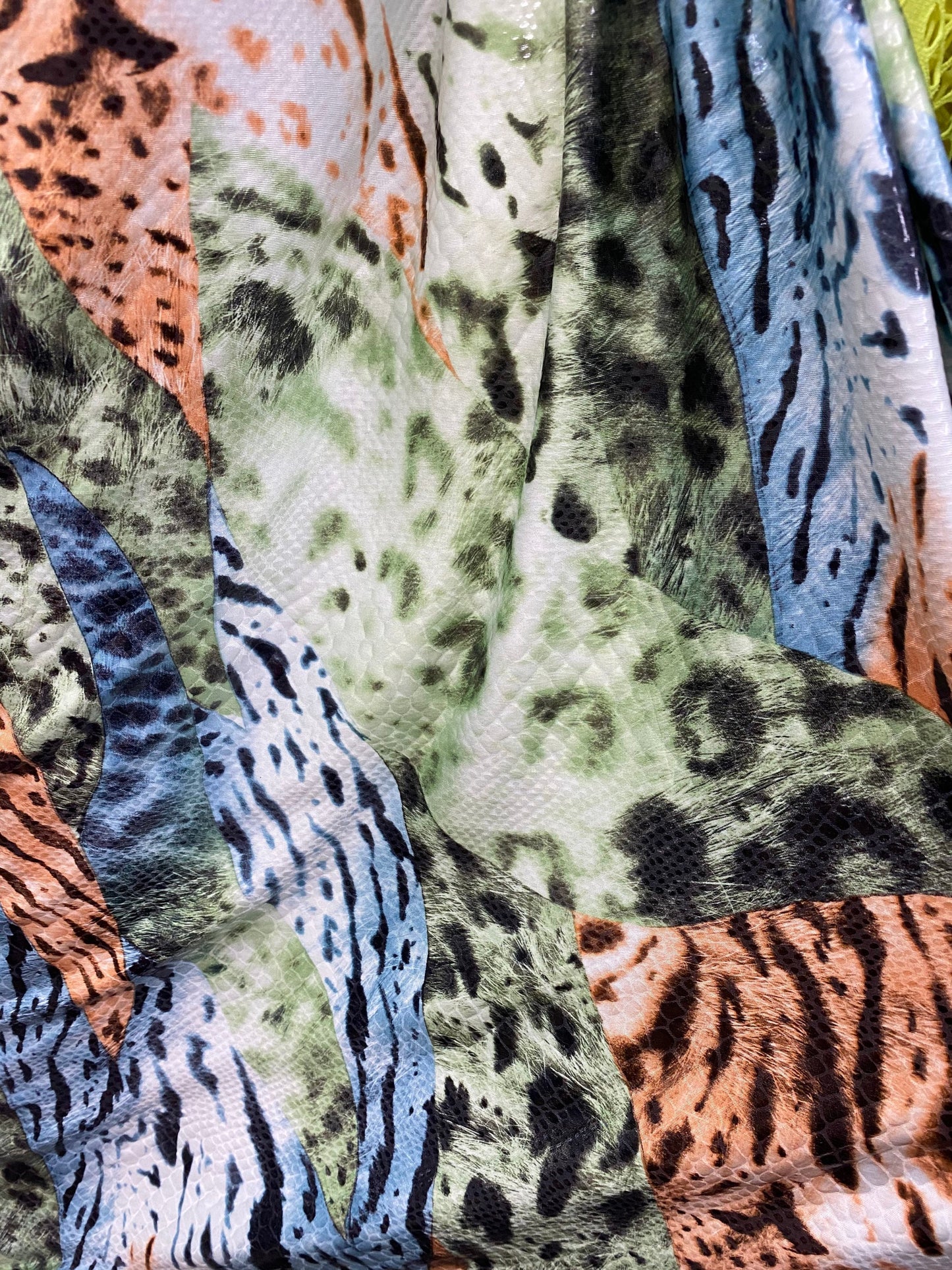 New Exotic multi animal print multicolor with clear foil print on poly spandex 2-way stretch 58-60” Sold by the YD. Ships Worldwide