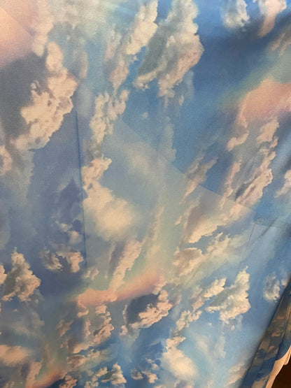 New celestial clouds design print on power mesh 4-way stretch 58/60” Sold by the YD. Ships worldwide from Los Angeles California USA.