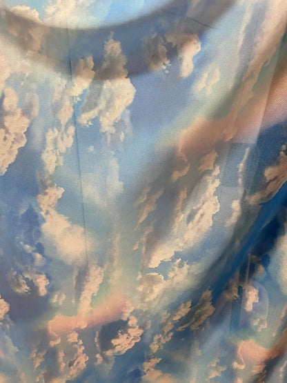 New celestial clouds design print on power mesh 4-way stretch 58/60” Sold by the YD. Ships worldwide from Los Angeles California USA.