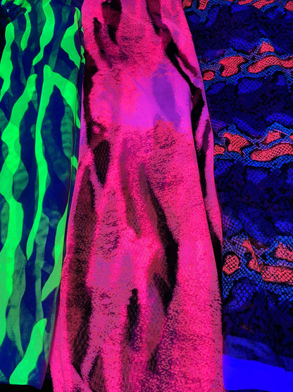 New Uv Light power mesh Exotic animal prints on mesh 4-way stretch 58/60” these mesh fabrics they glow in the dark with a black light