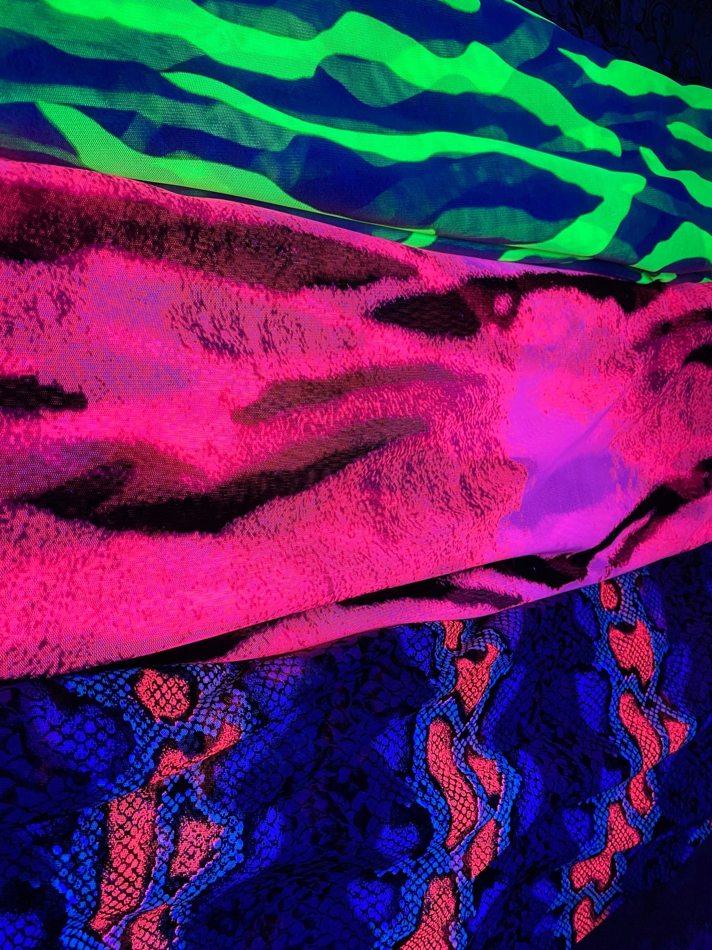 New Uv Light power mesh Exotic animal prints on mesh 4-way stretch 58/60” these mesh fabrics they glow in the dark with a black light