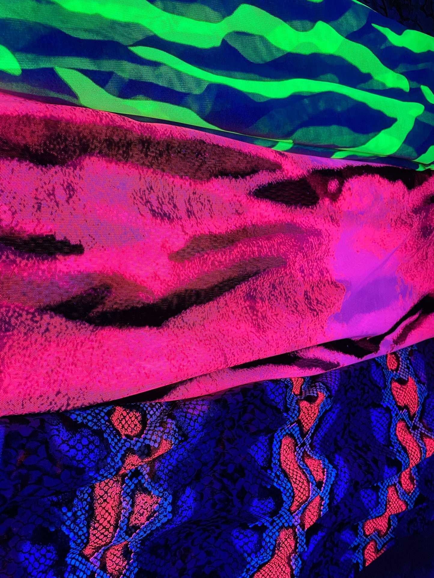 New Uv Light power mesh Exotic animal prints on mesh 4-way stretch 58/60” these mesh fabrics they glow in the dark with a black light