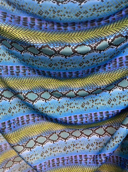 New sapphire exotic snake design print on nylon spandex 4-way stretch 58/60” Sold by the YD. Ships worldwide from Los Angeles California USA