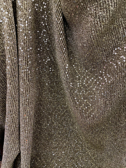 New pleated metallic spandex with glitz sequins all over 2-way stretch medium weight 55/56” Sold by the YD. Ships Worldwide from Los Angeles