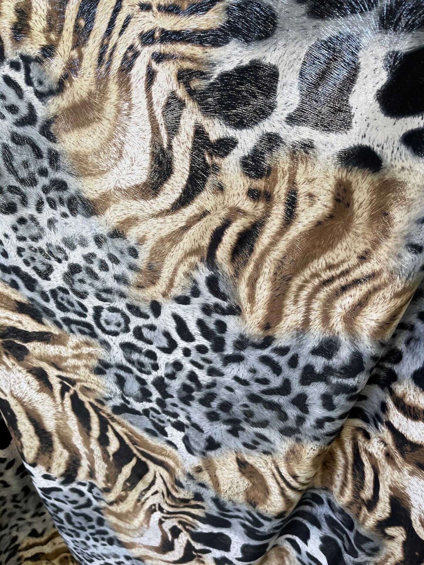 Exotic animal print design print on poly spandex medium weight 4-way stretch 58/60” Sold by the YD. Ships Worldwide from Los Angeles cali