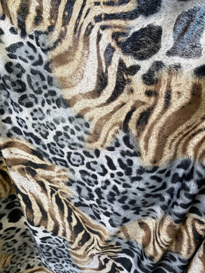 Exotic animal print design print on poly spandex medium weight 4-way stretch 58/60” Sold by the YD. Ships Worldwide from Los Angeles cali