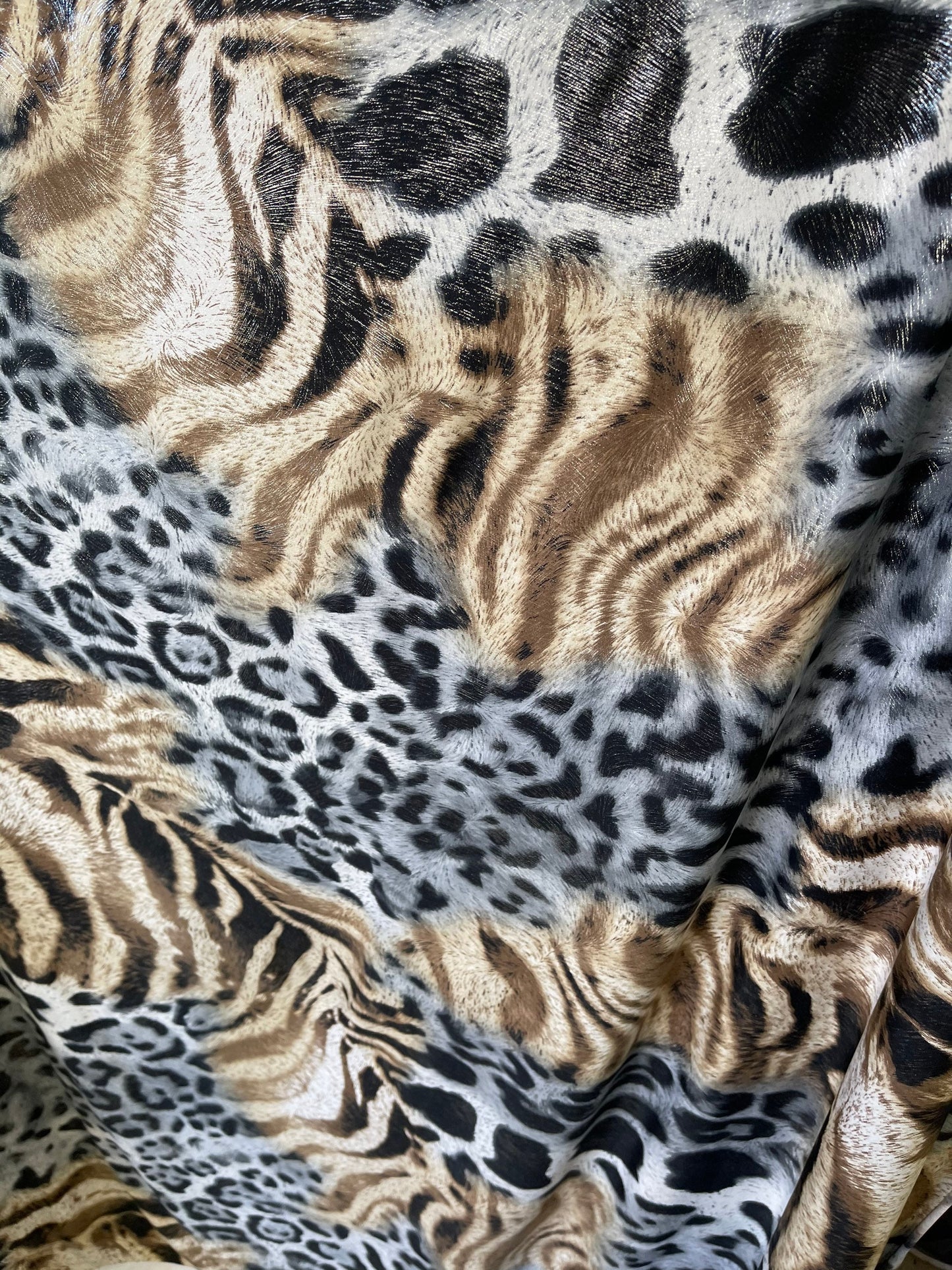 Exotic animal print design print on poly spandex medium weight 4-way stretch 58/60” Sold by the YD. Ships Worldwide from Los Angeles cali