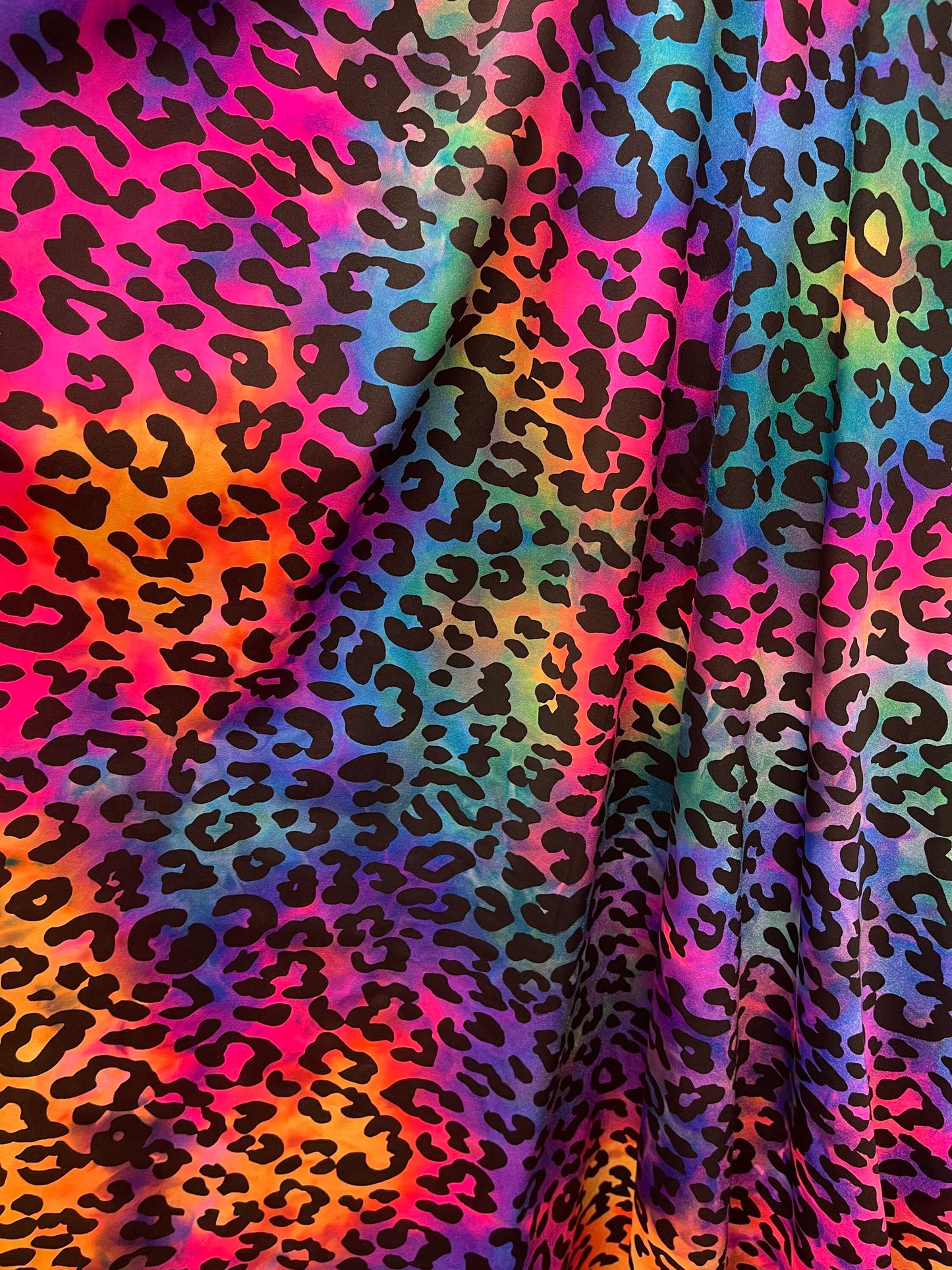 New Exotic leopard design rainbow multicolor 4way print nylon spandex 58/60” Sold by the YD. Ships worldwide from Los Angeles California USA