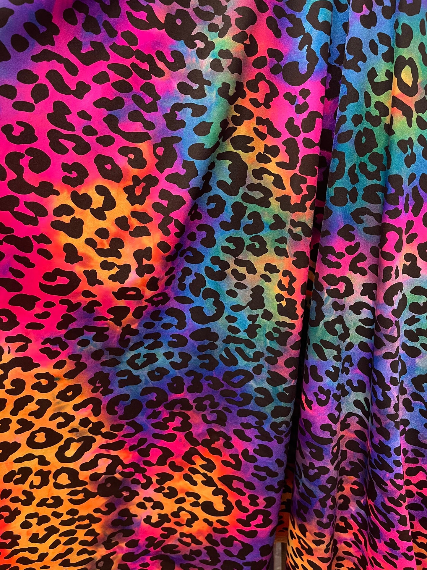 New Exotic leopard design rainbow multicolor 4way print nylon spandex 58/60” Sold by the YD. Ships worldwide from Los Angeles California USA