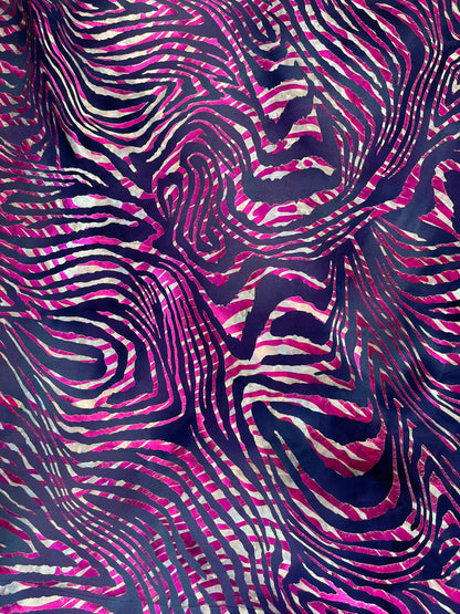 New Zebra design purple/pink metallic nylon spandex 4-way stretch 58/60” Sold by the YD. Ships Worldwide from Los Angeles California USA.