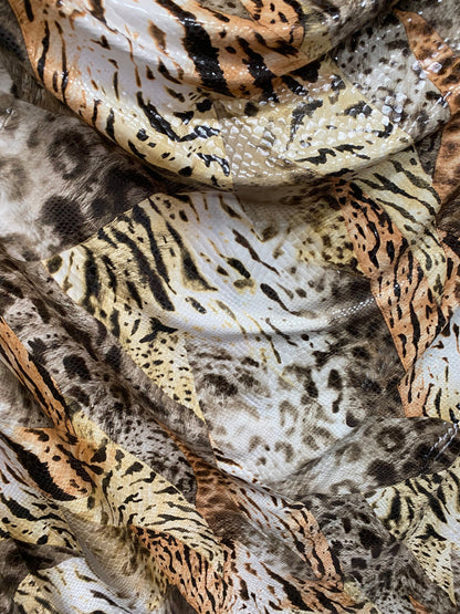 New Exotic multi animal print Taupe multicolor with clear foil print on poly spandex 2-way stretch 58-60” Sold by the YD. Ships Worldwide