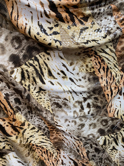 New Exotic multi animal print Taupe multicolor with clear foil print on poly spandex 2-way stretch 58-60” Sold by the YD. Ships Worldwide