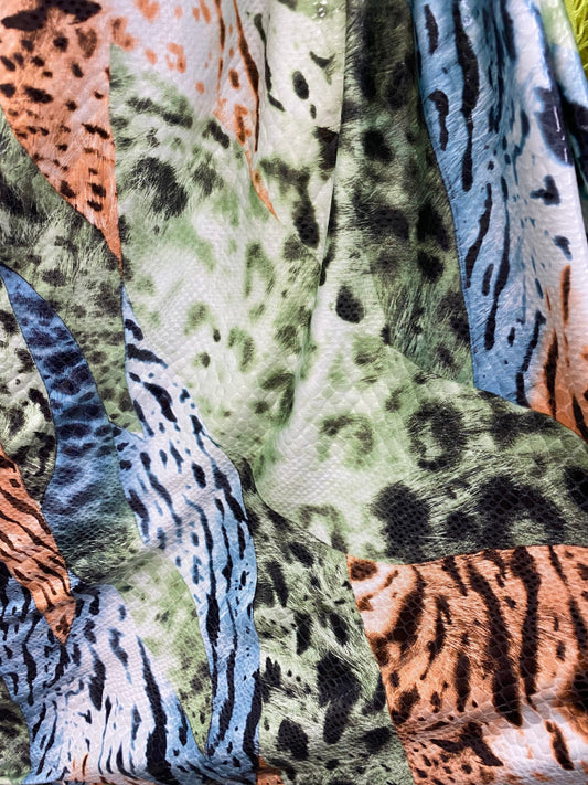 New Exotic multi animal print multicolor with clear foil print on poly spandex 2-way stretch 58-60” Sold by the YD. Ships Worldwide