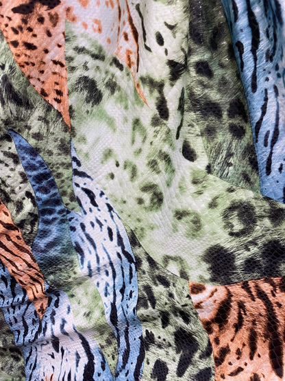 New Exotic multi animal print multicolor with clear foil print on poly spandex 2-way stretch 58-60” Sold by the YD. Ships Worldwide