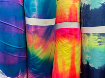 Tie dye Luxury shiny nylon spandex 4-way stretch 58/60” Sold by the YD. Ships Worldwide from Los Angeles California USA.