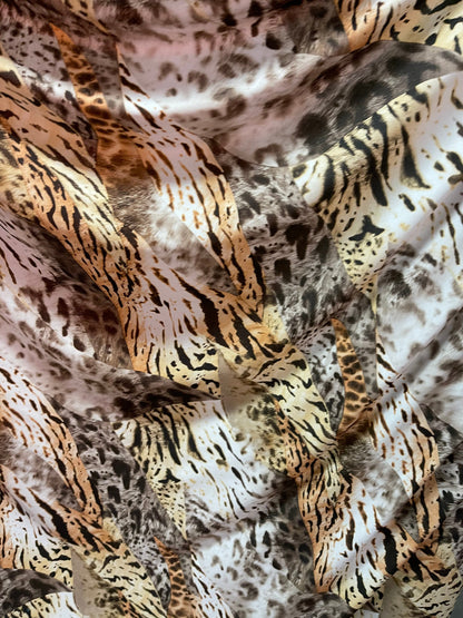 Exotic multi animal print multicolor print on poly spandex lightweight 4-way stretch 58/60” Sold by the YD. Ships Worldwide from Los Angeles