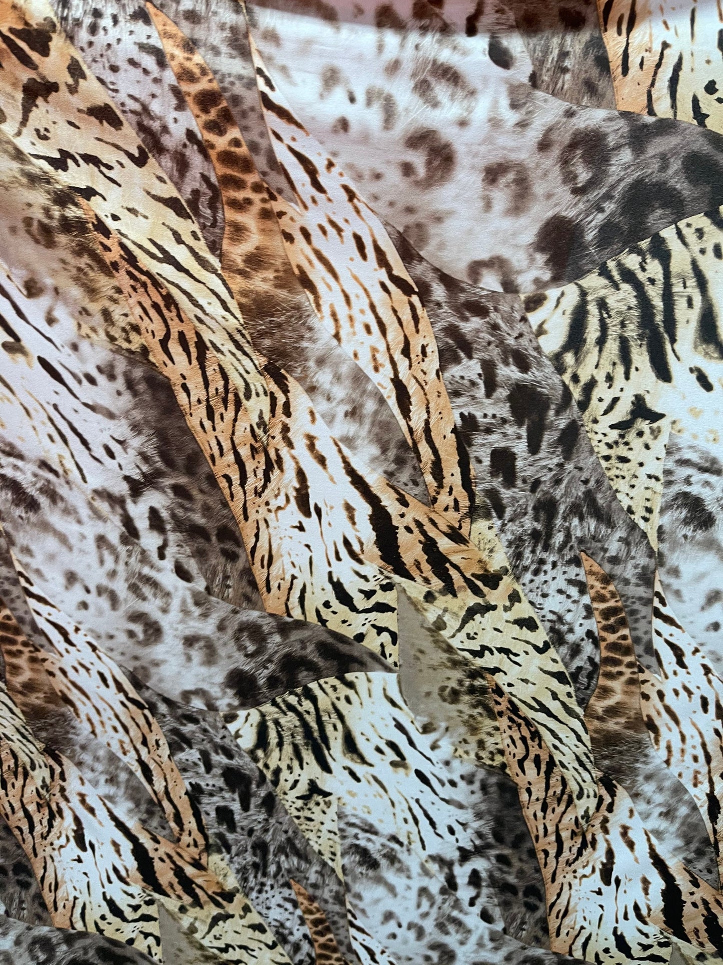 Exotic multi animal print multicolor print on poly spandex lightweight 4-way stretch 58/60” Sold by the YD. Ships Worldwide from Los Angeles