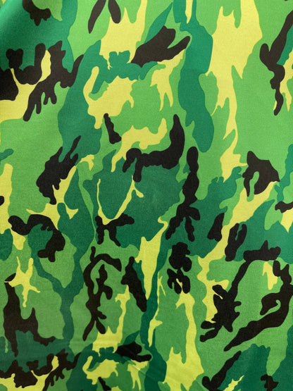 Camouflage design green/black print on nylon spandex 4 way stretch 58/60” Sold by the YD. Ships Worldwide from Los Angeles California USA.