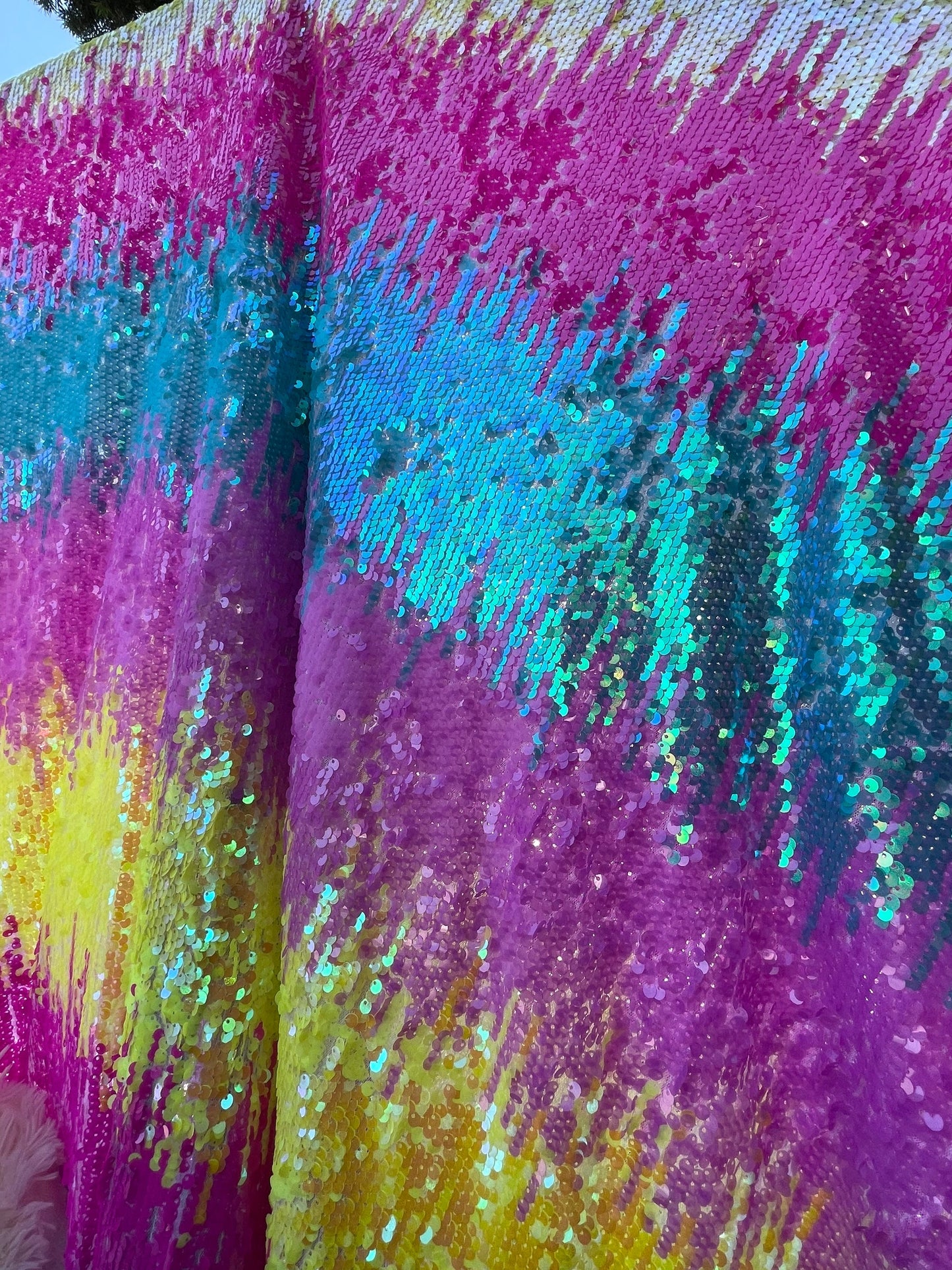 Rainbow sequins Luxury sequins embroidered on stretch mesh 2-way 58/60” Sold by the YD. Ships Worldwide from Los Angeles California USA.