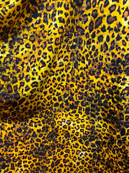 Exotic Leopard design gold/brown/Black print on best quality of nylon spandex 4-way stretch 58/60” Sold by the YD. Ships Worldwide