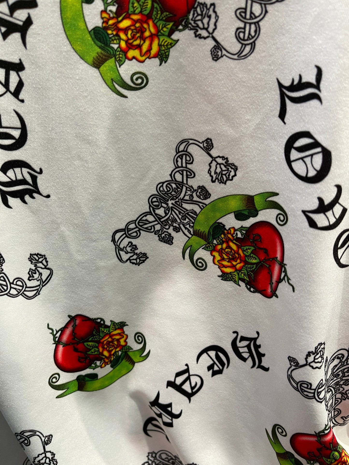 Great Love design print on poly spandex white/red 4-way stretch 58/60” Sold by the YD. Ships Worldwide from Los Angeles California USA.