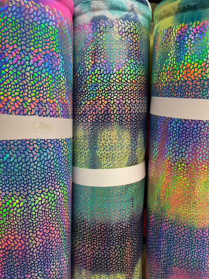 Tie Dye Dragón scales design Iridescent hologram sequins on best quality of nylon spandex 4-way stretch 58/60” Sold by the YD.