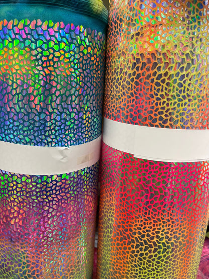 Tie Dye Dragón scales design Iridescent hologram sequins on best quality of nylon spandex 4-way stretch 58/60” Sold by the YD.