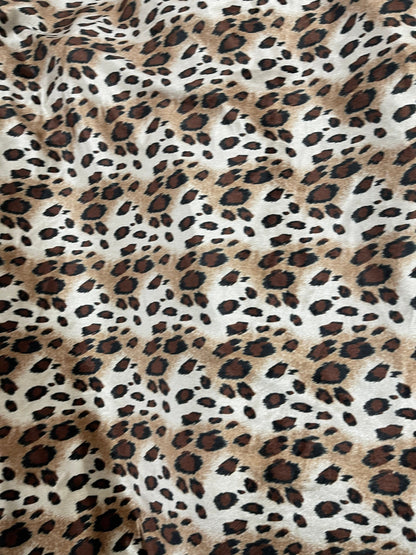 Exotic animal print on great quality of stretch velvet 4-way stretch 58/60” Sold by the YD. Ships Worldwide from Los Angeles California USA.