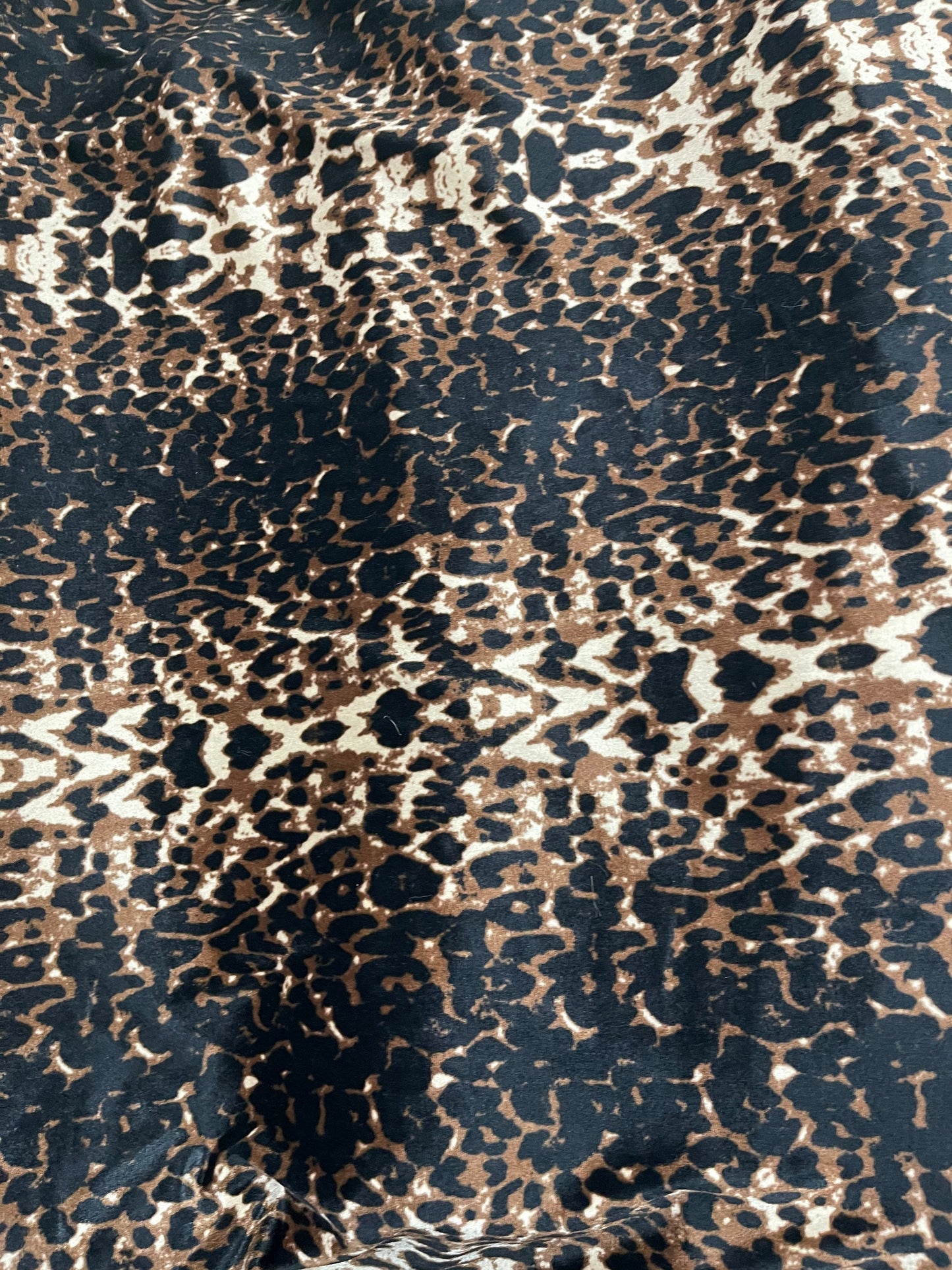 Black Jaguar design exotic animal print on great quality of stretch velvet 4-way stretch 58/60” Sold by the YD. Ships Worldwide