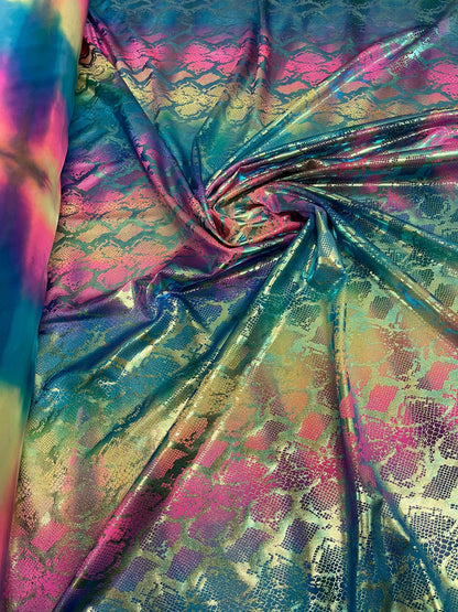 Exotic King snake design tie dye metallic nylon spandex with iridescent foil 4-way stretch 58/60” Sold by the YD. Ships worldwide