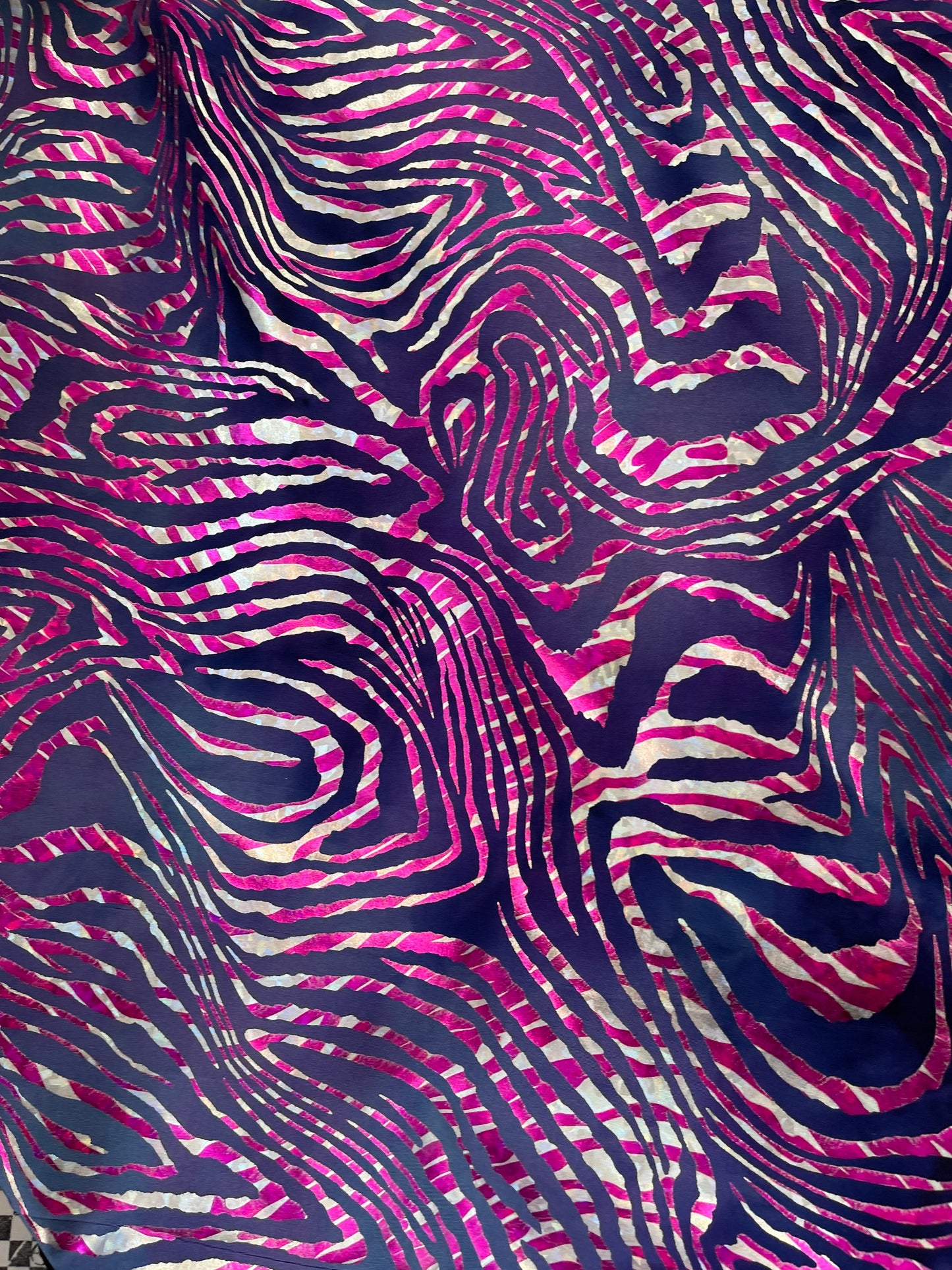 New Zebra design purple/pink metallic nylon spandex 4-way stretch 58/60” Sold by the YD. Ships Worldwide from Los Angeles California USA.