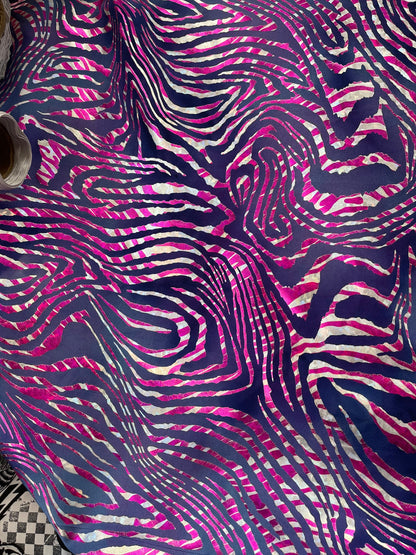 New Zebra design purple/pink metallic nylon spandex 4-way stretch 58/60” Sold by the YD. Ships Worldwide from Los Angeles California USA.