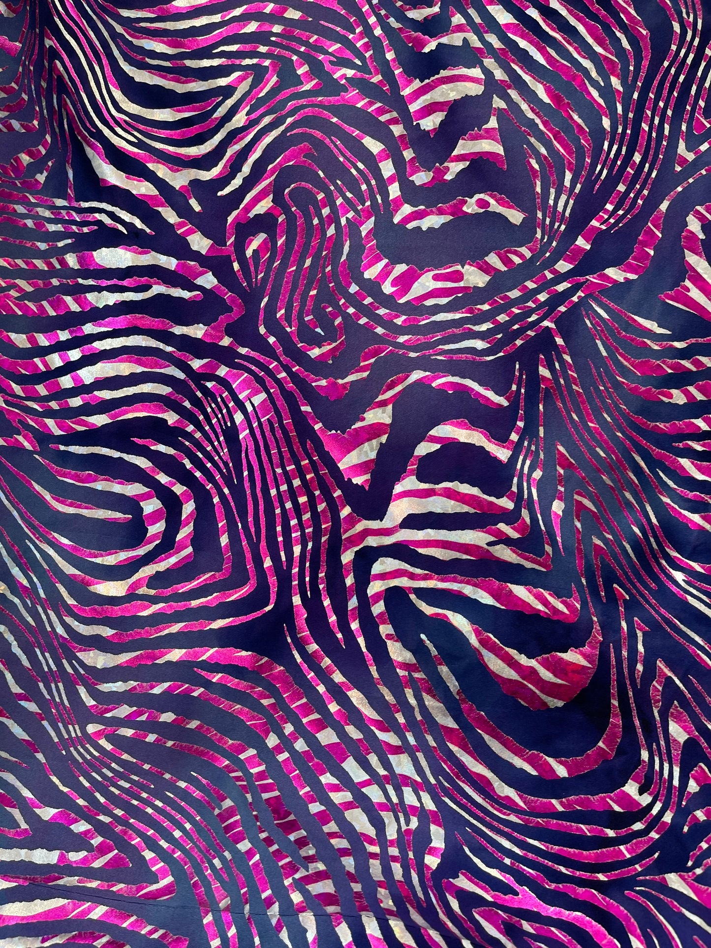 New Zebra design purple/pink metallic nylon spandex 4-way stretch 58/60” Sold by the YD. Ships Worldwide from Los Angeles California USA.