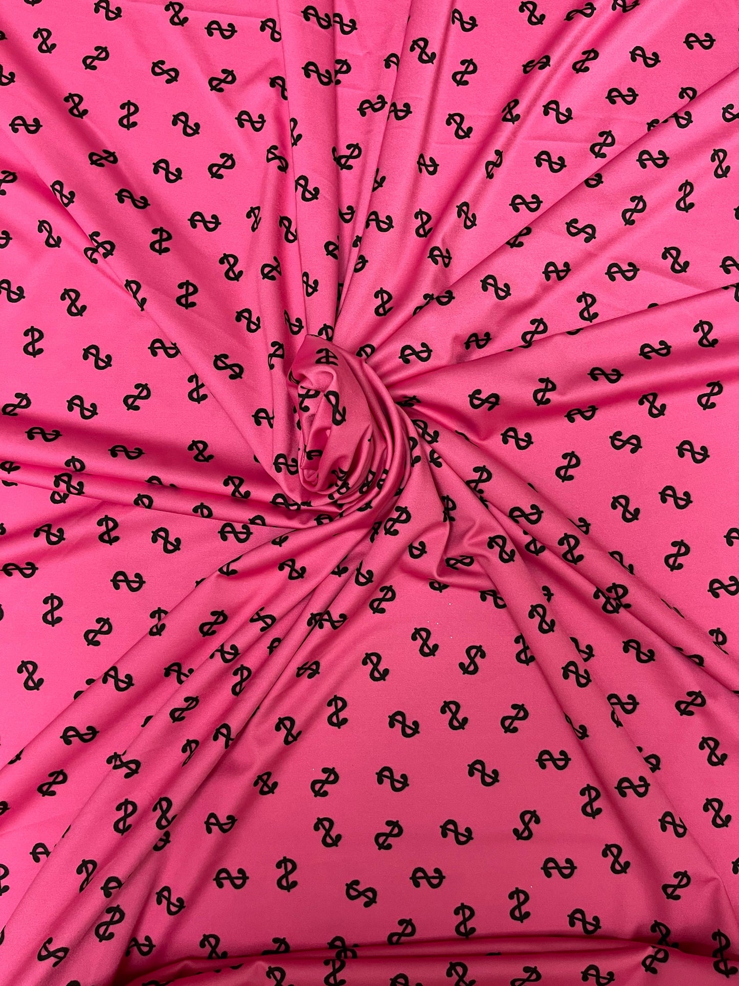 Money symbol design  pink/black print on best quality of nylon spandex 4-way stretch 58/60” Sold by the YD. Ships Worldwide from Los Angeles