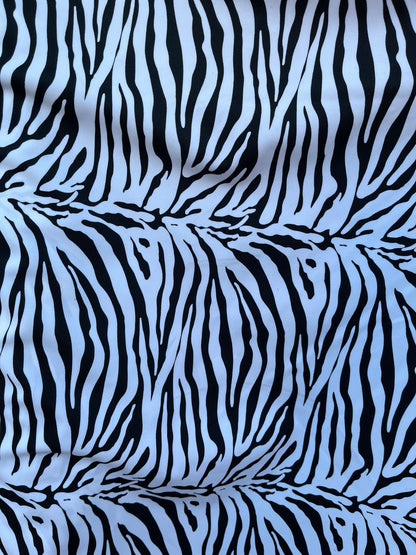 New Exotic zebra design medium size print on best quality of nylon spandex 4-way stretch 58/60” Sold by the YD. Ships Worldwide from L.A CA.