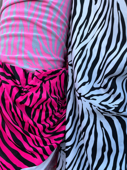 New Exotic zebra design medium size print on best quality of nylon spandex 4-way stretch 58/60” Sold by the YD. Ships Worldwide from L.A CA.