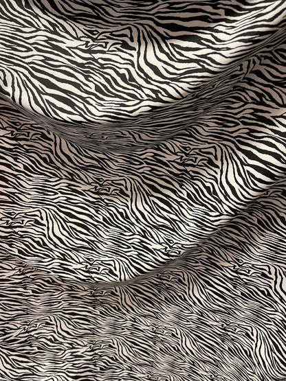 New Exotic zebra design medium size print on best quality of nylon spandex 4-way stretch 58/60” Sold by the YD. Ships Worldwide