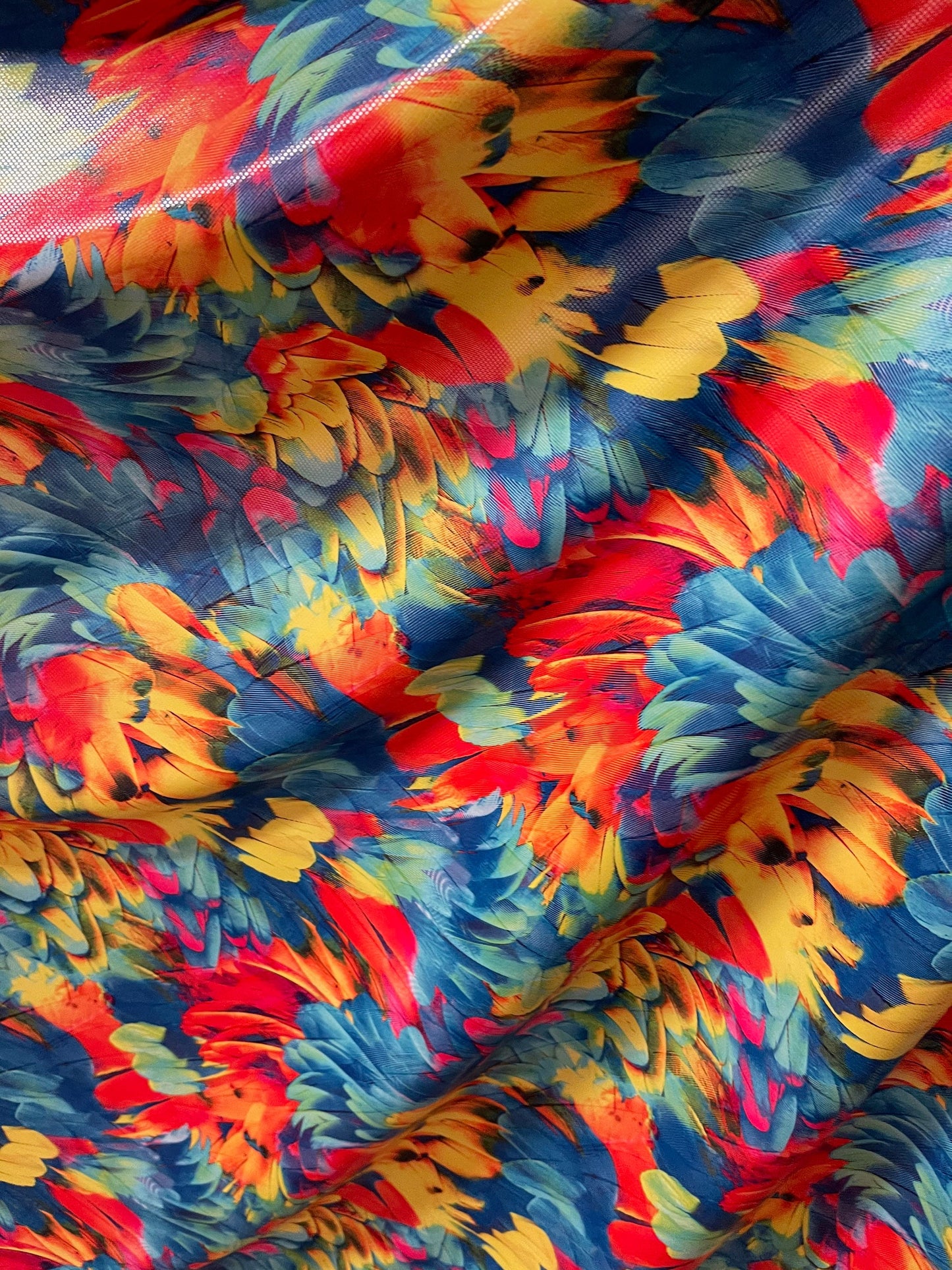 Exotic feathers design multicolor print on best quality of nylon spandex with clear dot 4-way stretch 58/60” Sold by the YD. Ships Worldwide