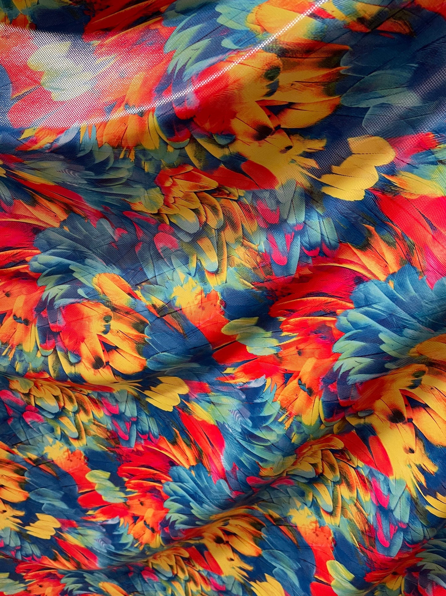 Exotic feathers design multicolor print on best quality of nylon spandex with clear dot 4-way stretch 58/60” Sold by the YD. Ships Worldwide