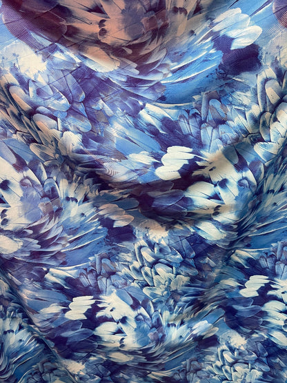 Exotic feathers design blue color print on best quality of nylon spandex with clear dot 4-way stretch 58/60” Sold by the YD. Ships Worldwide