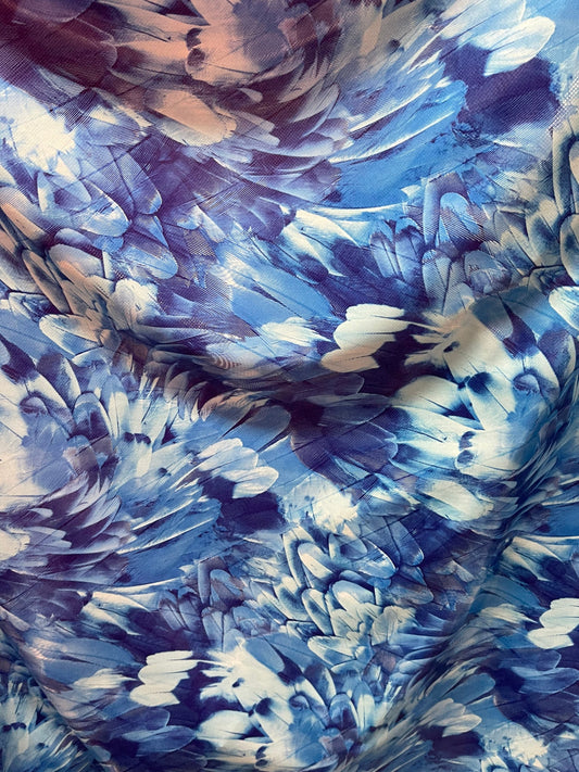 Exotic feathers design blue color print on best quality of nylon spandex with clear dot 4-way stretch 58/60” Sold by the YD. Ships Worldwide