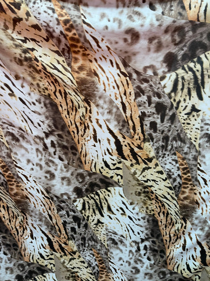 Exotic multi animal print multicolor print on poly spandex lightweight 4-way stretch 58/60” Sold by the YD. Ships Worldwide from Los Angeles