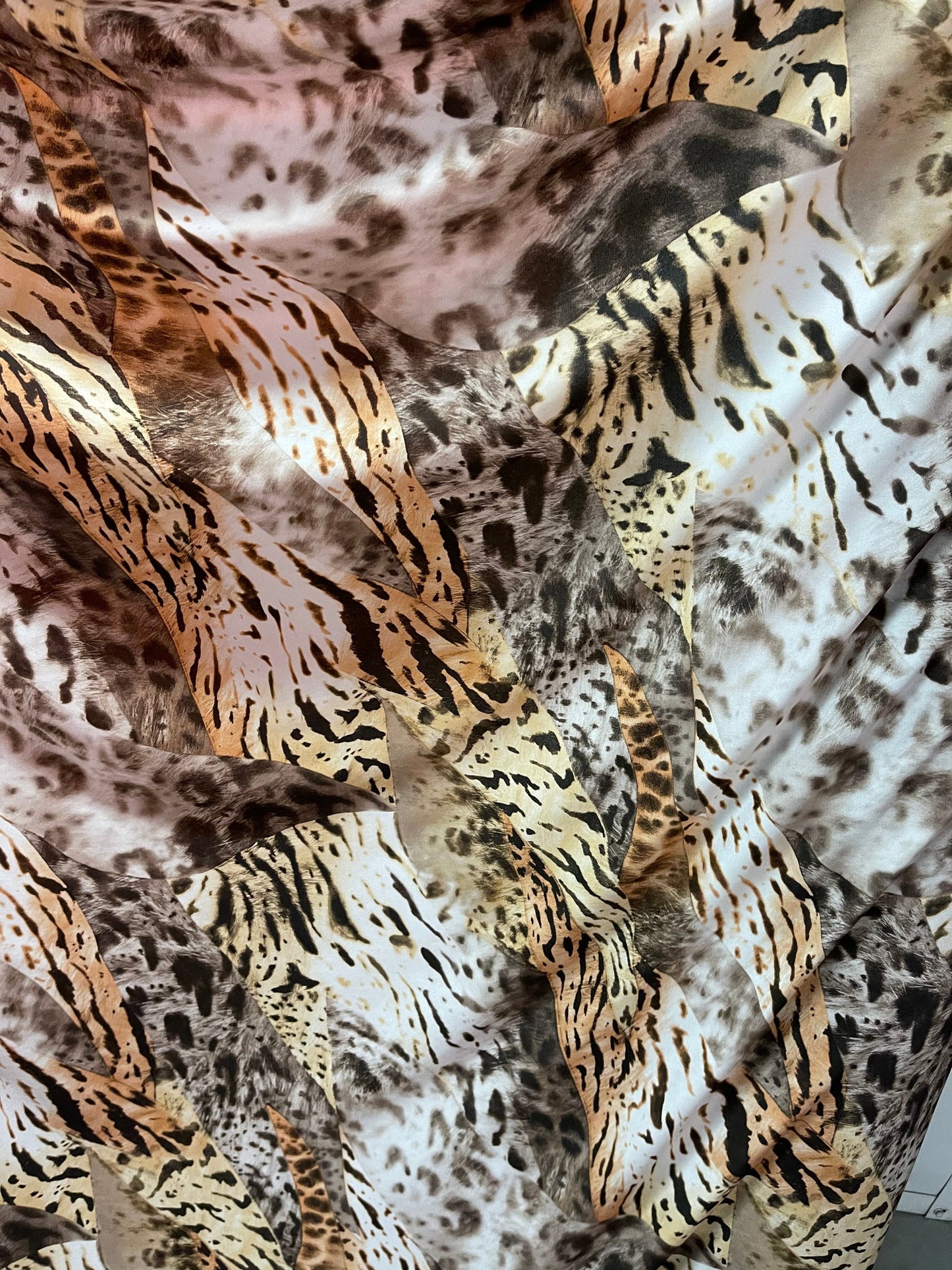 Exotic multi animal print multicolor print on poly spandex lightweight 4-way stretch 58/60” Sold by the YD. Ships Worldwide from Los Angeles