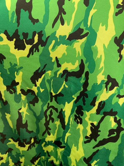 Camouflage design green/black print on nylon spandex 4 way stretch 58/60” Sold by the YD. Ships Worldwide from Los Angeles California USA.