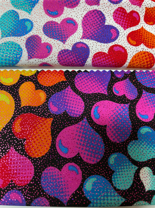 Multi heart design print on nylon spandex with foil 4way Stretch 58/60” Sold by the yd. Ships worldwide from Los Angeles California USA