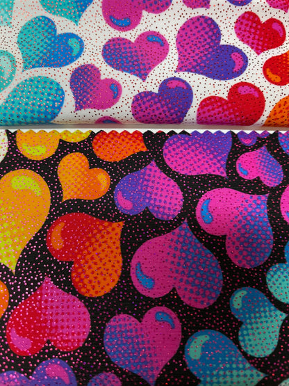 Multi heart design print on nylon spandex with foil 4way Stretch 58/60” Sold by the yd. Ships worldwide from Los Angeles California USA