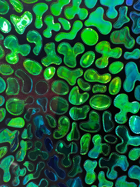 New Pebbles design Iridescent foil sequins embroidered on stretch velvet 2-way 58/60” Sold by the YD. Ships Worldwide from Los Ángeles CA