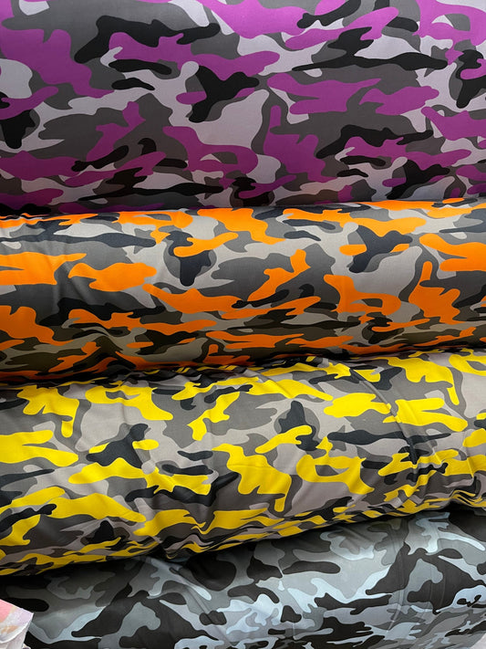 Camouflage design print on nylon spandex 4-way stretch 58/60” Sold by the YD. Ships Worldwide from Los Angeles California USA.