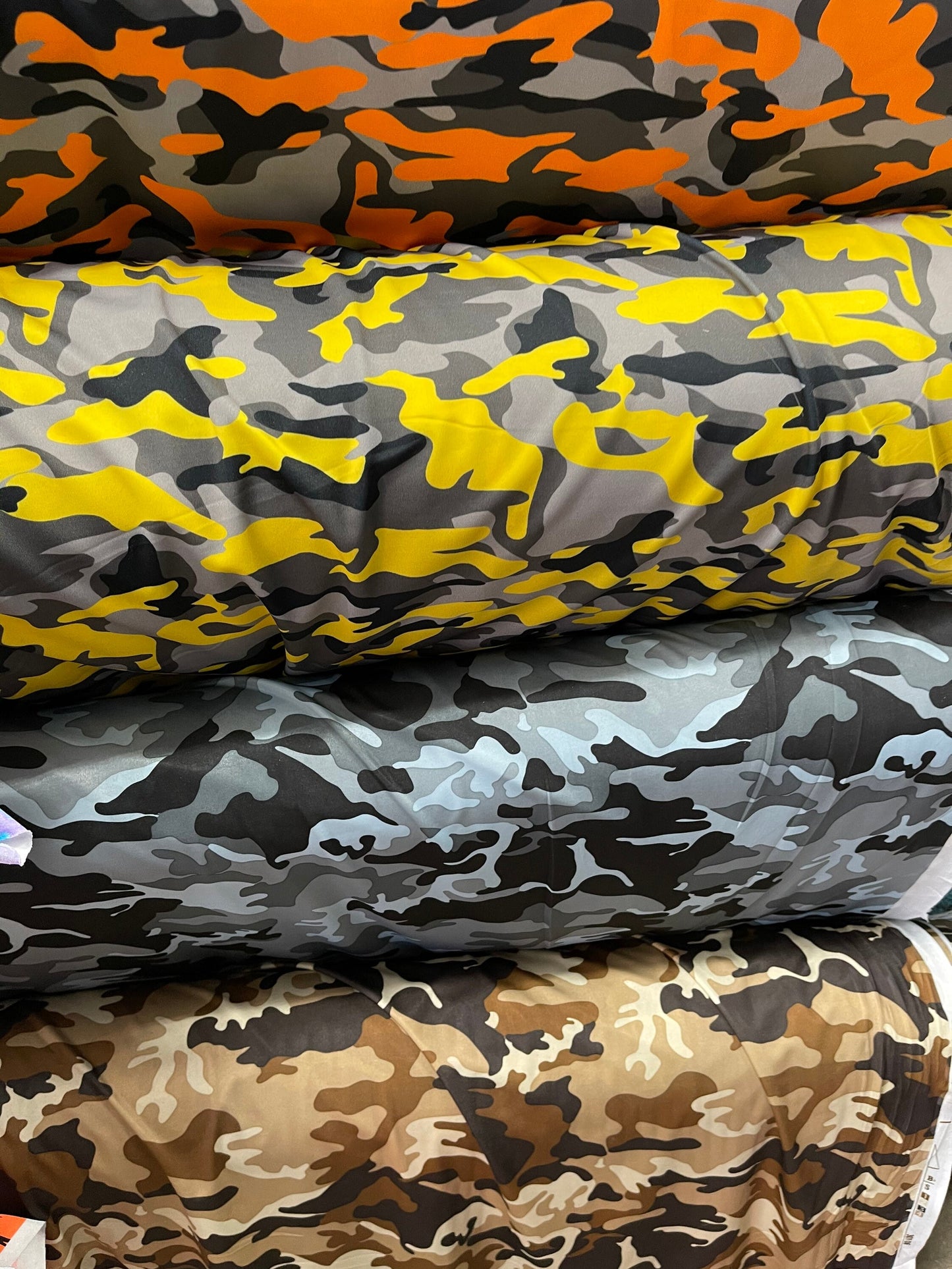 Camouflage design print on nylon spandex 4-way stretch 58/60” Sold by the YD. Ships Worldwide from Los Angeles California USA.